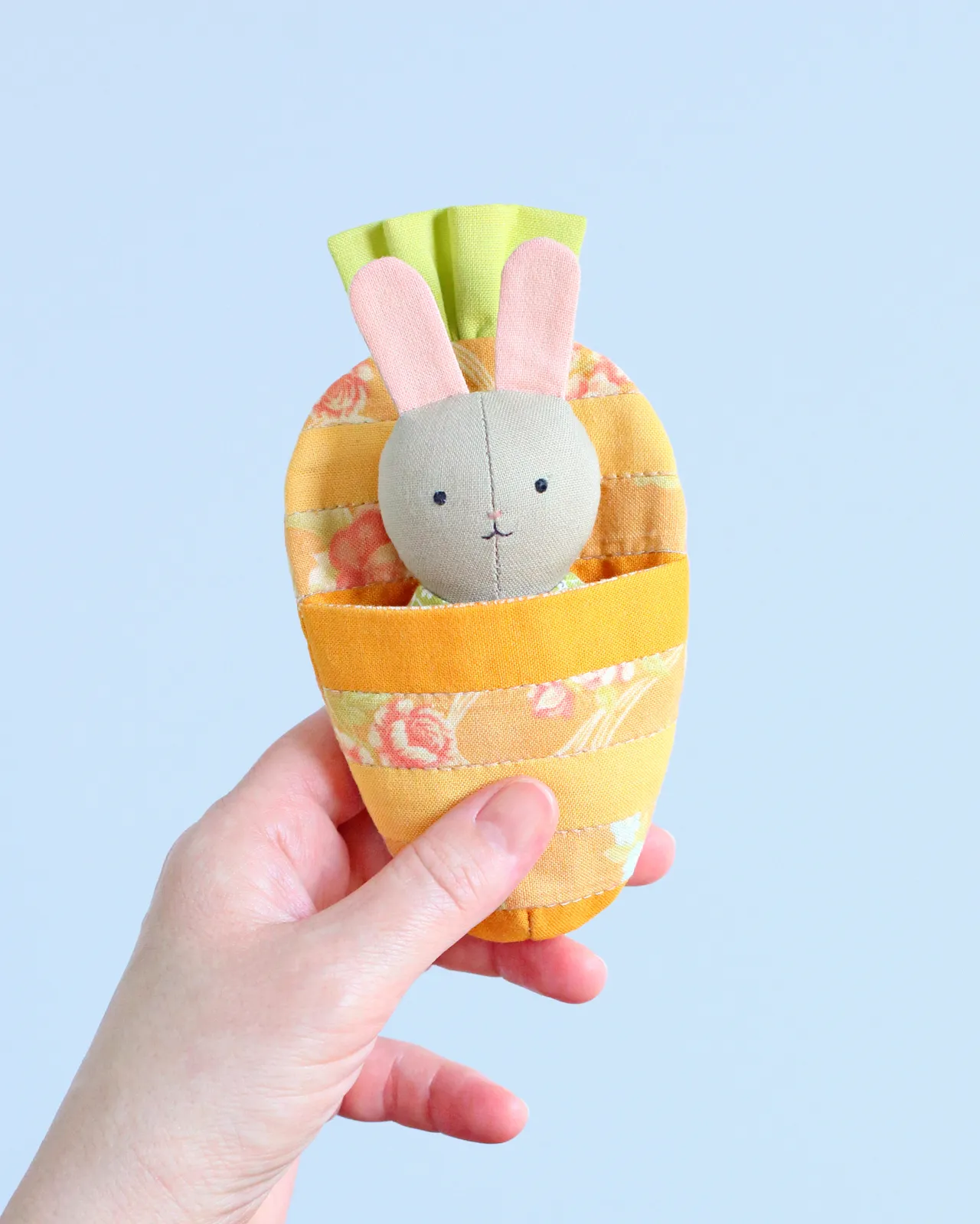 Fresh off the sewing machine! The tiniest quilted carrot you’ll ever see! Part of my new Pocket Series — where every toy fits in your palm (and yes, it does have a sleepy resident!).
