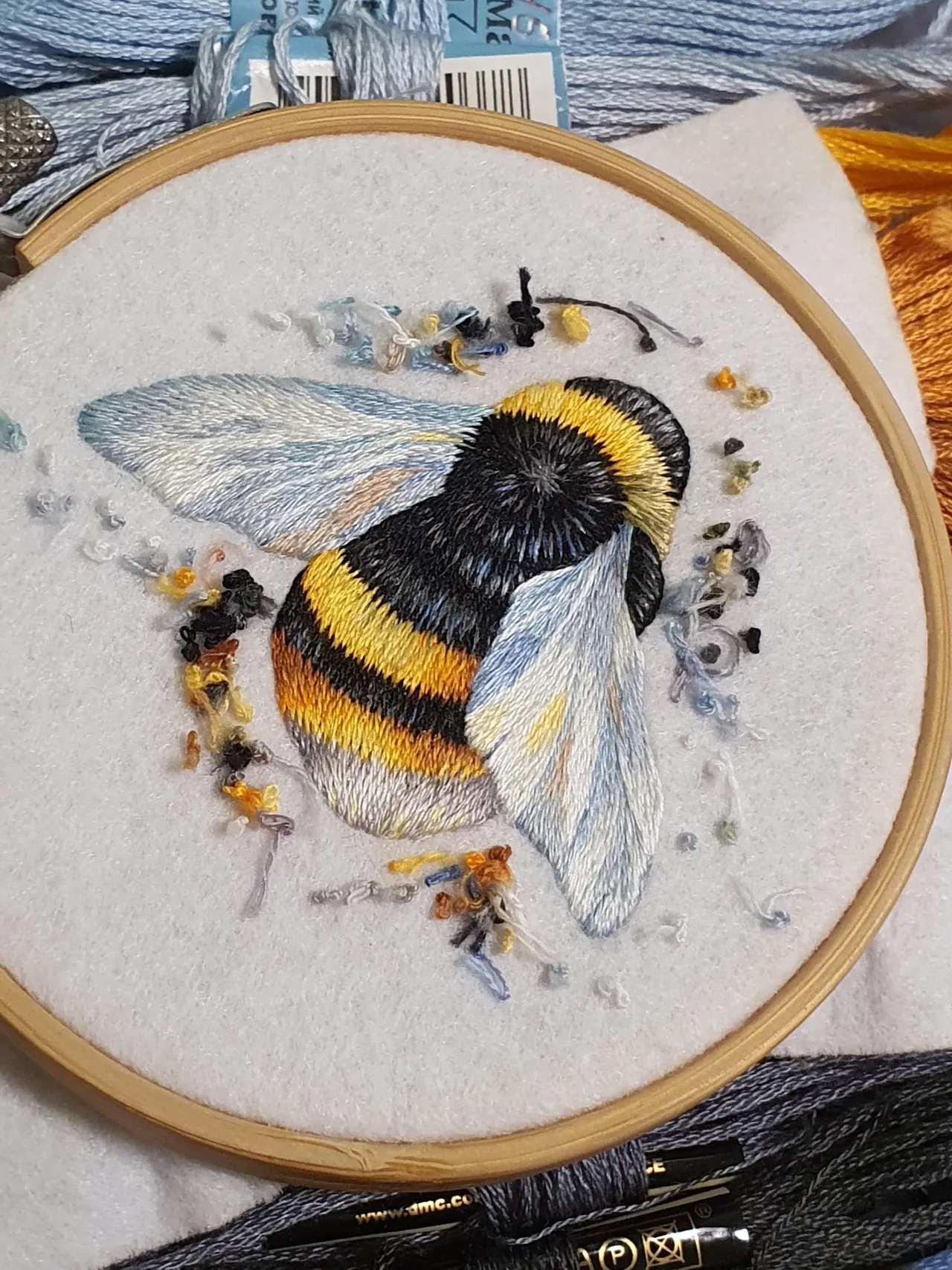 I am drawing. My paints are threads, and my brush is a needle in my hands. Please like if you enjoy watching the embroidery process.