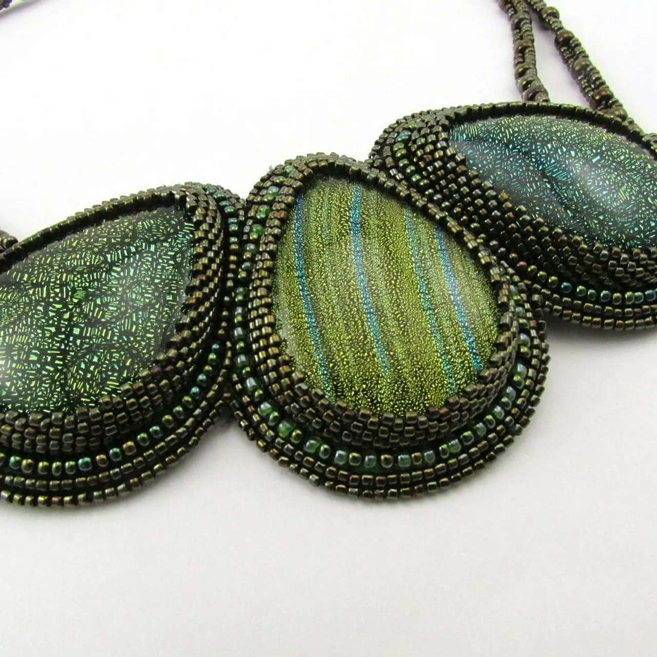 Колье InBronze, с дихроичным стеклом, блестит, сверкает и переливается💎💎💎
в наличии, 2000ру
#украшения #украшенияназаказ #украшенияручнойработы #украшениямосква #кольеизбисера #вышивкабисером #ручнаяработа #зеленый #бронзовый #бисер #колье #кольеворотник #бисерноеколье #блестящееколье #блеск #хэндмэйд #handmade #bead #jewelry #jewellery #jewelry #necklace #shiny #beads #beadwork #bead #green #craft #dichroic #dichroicglass