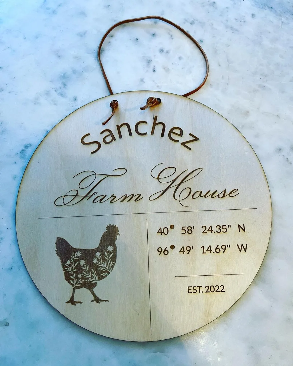 Adorn your home with your own custom stamp! This 10" round plaque can be placed on the interior or exterior of your home. Each item is sealed by hand with American beeswax. Water will bead and run off! Engraved on the wood of your choice of birch, walnut, cherry, or mahogany and in your design of choice. Each plaque hangs by our signature suede strap.
Have a design in mind? We'd love to bring it to life for you? Need a little help designing? We will design your perfect plaque at no extra charge! Available in round up to 10", square up to 10"x10", or rectangle up to 11"x19". Link in bio.
#homedecor #home #custom #design