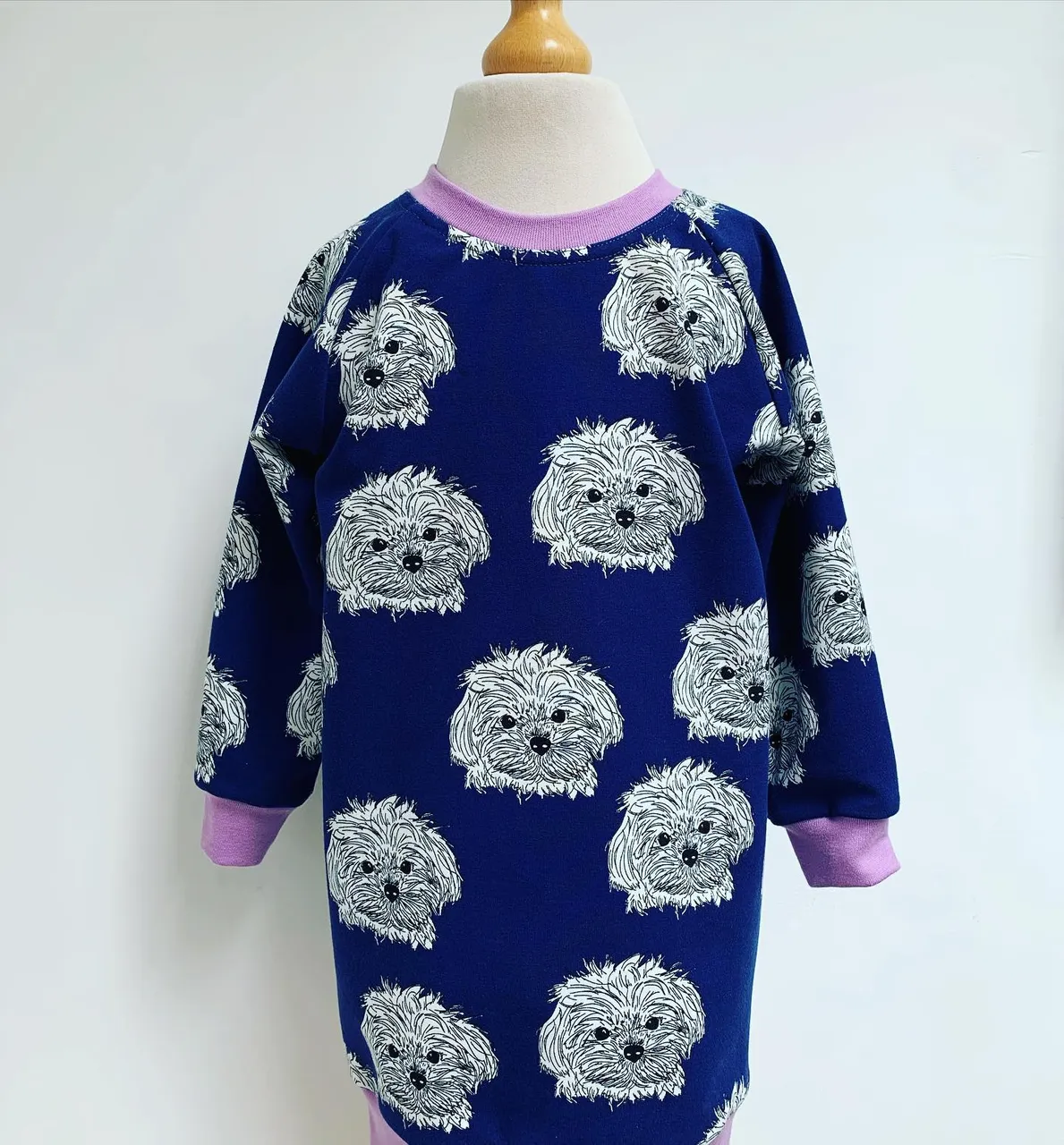 How cute is this dog fabric? 😍We just had to see what it looked like as a jumper dress and snood jumper. #dogfabric #jumperdress #snoodjumper #TheCornerat96 #SupportSmallBusiness #KeepItLocal #MycenaeHouse #OurCommunity #ItsComing #DeckTheHalls #shopsmall #shoplocal #handmadeuk #solocraftfair #bermondseyfair #deptforddoesart #madeingreenwich #handmadechildrensclothes