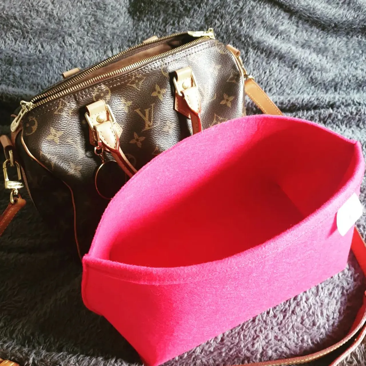 Last weekend before Christmas, using my new to me #speedybandouliere25 
Making the best of family time.
I have opted for a Basics insert, hot pink felt and no pockets. It still gives great support and makes the bag less dark. 
I also made a repurposed canvas medallion for it.
All available on
www.luxurybagheaven.com 
Classic bag with a twist of the added strap
#speedy20 #luxurybagheaven #speedy30 #speedy25 #lvspeedy25 #lvspeedy #lvspeedy25b #speedyb #repurpose #monogram #bagorganizer #bagorganiser #baginsert #madeinscotland #madeinuk