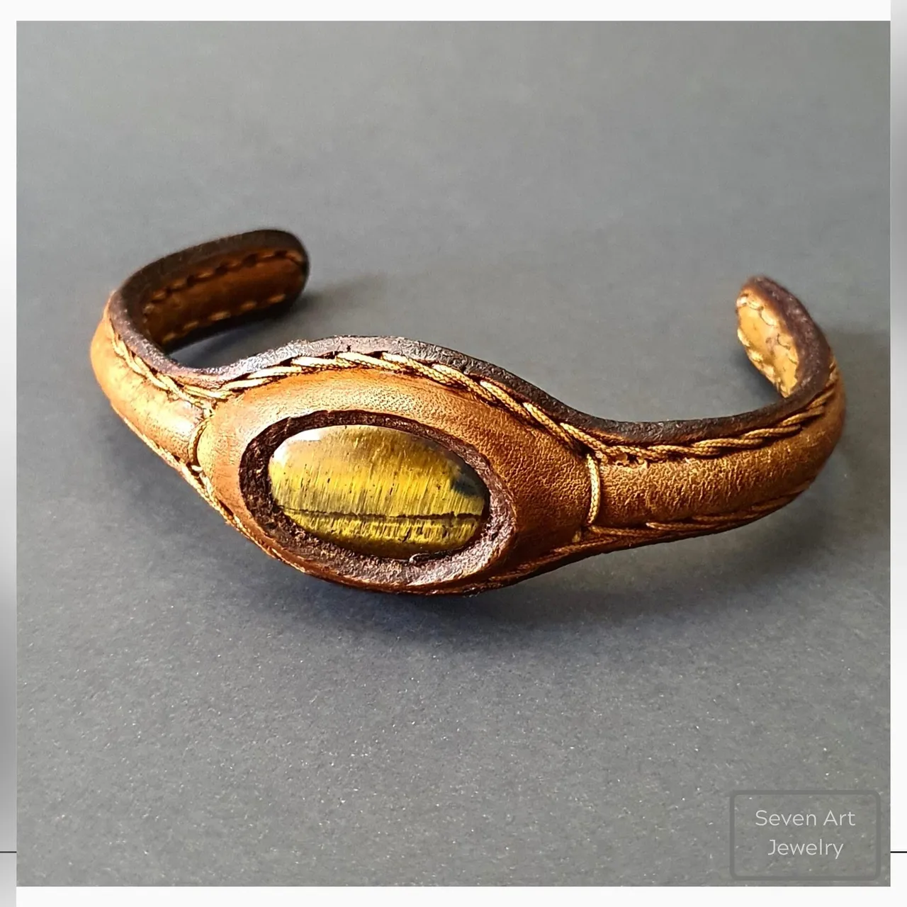 GENUINE LEATHER CUFF WITH NATURAL GEMSTONE
Handmade Natural Gemstone Jewelry

All our design prepares according to your given size with love.

Please visit our #esty shop for order;
https://www.etsy.com/shop/SevenArtJewelry

#etsy#hematitestone#handmadejewelry#sevenartjewelry#etsysuccess#etsyshop#etsymarket#uniquedesign#qualityworkmanship#qualitystone#leather#leathercuff#agate#tigerseye#labradorite#genuineleather