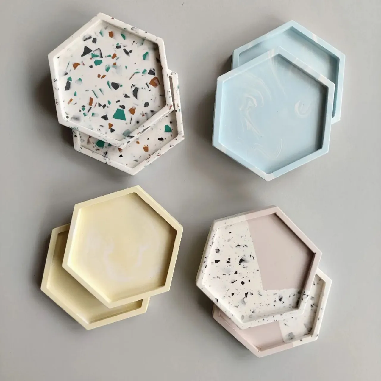 Coasters 😍

#coasters 
@jesmonite_ltd 
#hexagon 
#homeware 
#pastelaesthetic 
#rerrazzodesign 
#home 
#ecodecor 
#etsyseller 
#smallbusiness 
#jesmonitedecor 
#marble 
#etsy
#handmade
