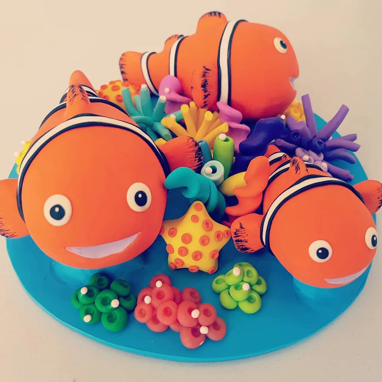 This is super cute birthday cake topper 😉 with the clownfish theme this have just the right amount of sparkle. It capture your under the sea theme beautifully 🤗
You will find more cake toppers in my shop in bio 👉👉🎂😉 #clownfish #clownfishes #birthday🎂 #firstbirthdayparty #caketoppers #undertheseaparty #cakedecoration #birthdaycenterpiece #oceanbirthday #undertheseatheme #polymerclaylove #smallbusinesslife #etsysellersofinstagram #etsyshop #etsyseller #lovemakingart #birthdaycake #birthdaycaketopper #caketopper #1stbirthday