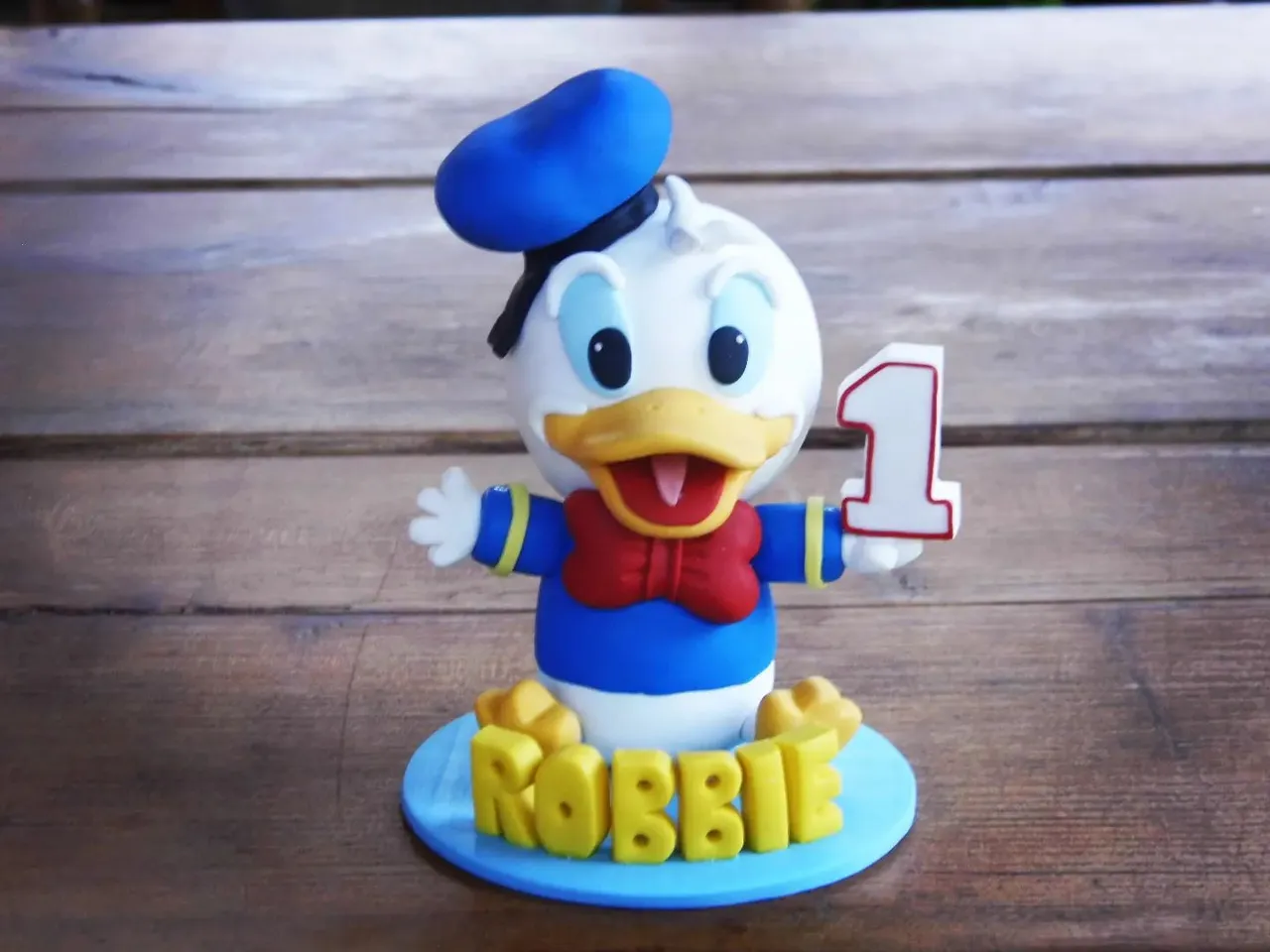 Cute 1st birthday cake topper π
#disney #donaldduck #disneybirthdayparty #cakefigurine #donaldduckfigure #cartoonart #birthdaycaketoppers #smallbusinesses #caketopperideas #polymerclayart #polymerclayfigurine #customcaketopper #disneyworld #followme #love #likes #beautiful #smile #handmade #likeforlikes #followforfollowback #shopsmall
