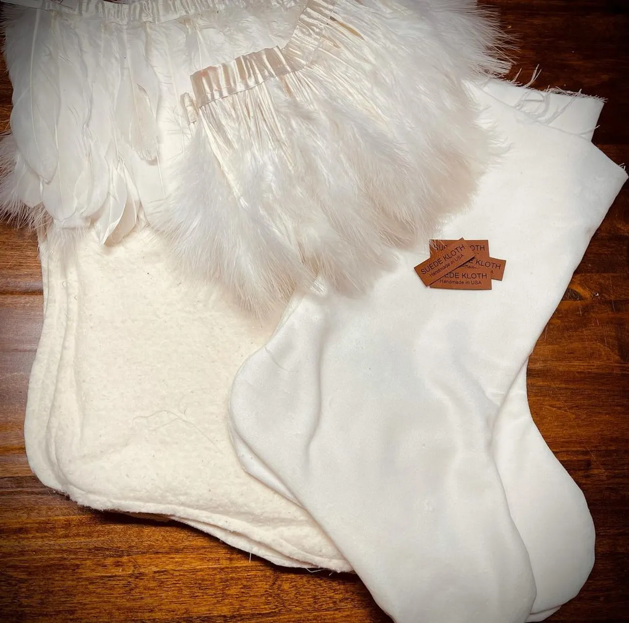 It’s stocking day here at SUEDKLOTH! Christmas is right around the corner and it might be time to refresh your decor. Order your handmade in America Christmas stockings now so you have them in time for your holiday decorating! #christmas #christmasstockings #fireplace #christmaseve #holiday #decor #handmade #mantledecor #cookies #madeinamerica #velvet #feathers
