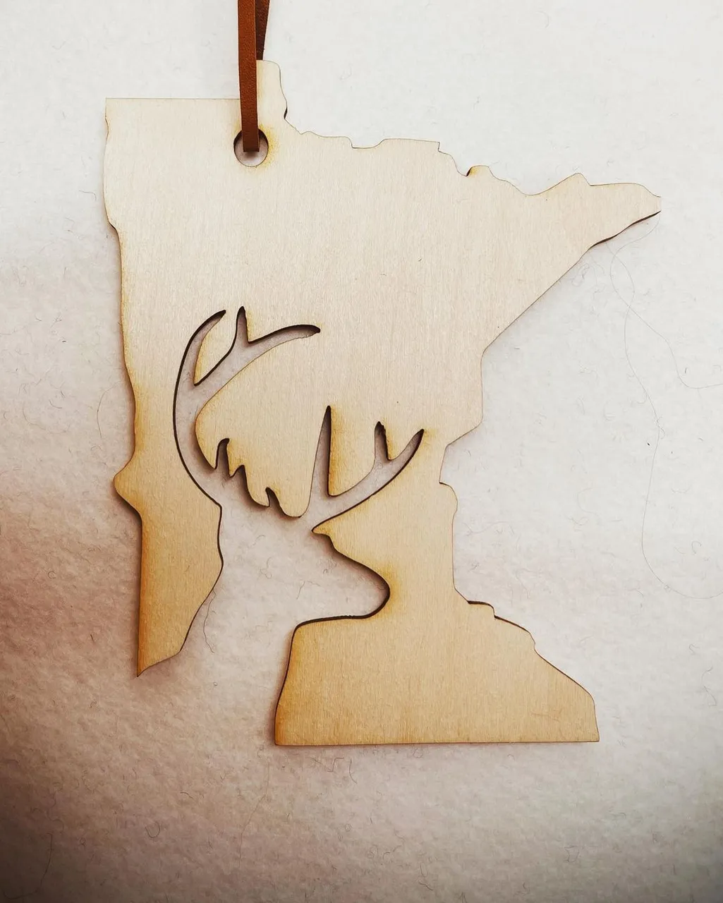 NEW DECOR!!!! Featuring our latest addition for you to order. Want it customized? D.M.  me. Web link in profile. 

#new #ornament  #christmas #christmaspresents #giftideas #madeinmn #wholesale #custom #minnesota #madeusa🇺🇸 #madeinamerica #minnesnowta #christmascountdown