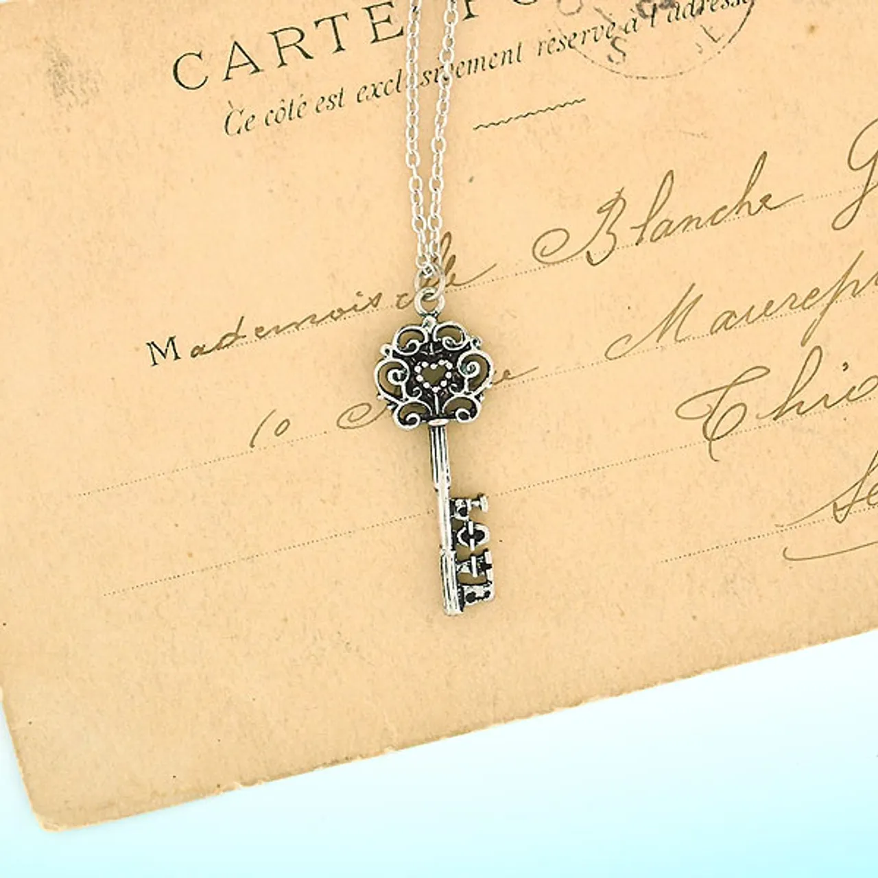 LAVISHY 883-102 vintage style key of love necklace: From Flare collection by LAVISHY, this handmade vintage style key of love pendant necklaces were original designs of LAVISHY. We are quit proud of this design where you place a heart shape in the middle of the top part the key and LOVE at the end of the key. They make great gifts for your loved one.
Base metal: Zinc alloy
Plating: Imitation silver, gold, brass, antique silver & antique gold
Safety: Nickel & lead free, non-allergenic / hypo-allergenic
Measurement:
 -Pendant:  inch /  cm
 -Chain: 18 inch with 2 inch extension chain LAVISHY logo tag
Wholesale available at www.lavishy.com with other unique & fun fashion jewelry for gift shop & boutique buyers. We ship worldwide since 2001.