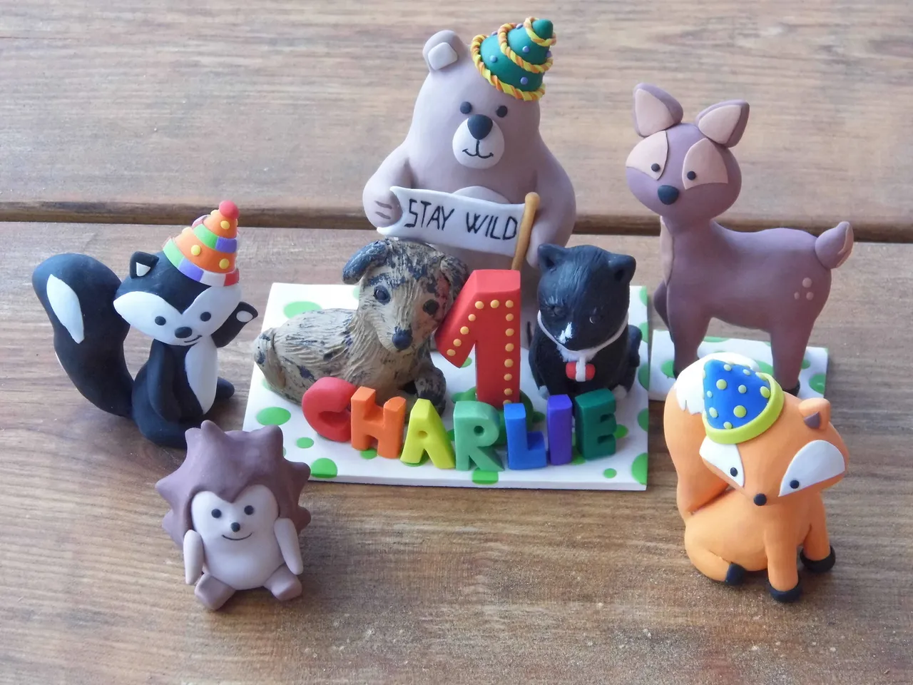This woodland animals with party hat topped, dog and a cat are great addition to a woodland themed birthday party. Use as a centerpiece for the party table or as a cake topper. Perfect memento after the party! 😉
#birthdaycaketopper #Forestanimals #Customcaketopper #Dog #Cat #Woodlandanimals #Bear #Fox #Skunk #Deer #Hedgehog #Polymerclay #animals #partydecoration #centerpiece #forestanimals #dogfigurine #catfigurine #creation #Etsyseller #smallbusiness #firstbirthday #birthdayparty #personalized #birthday #etsy #cakedecorating #cakesofinstagram #cake