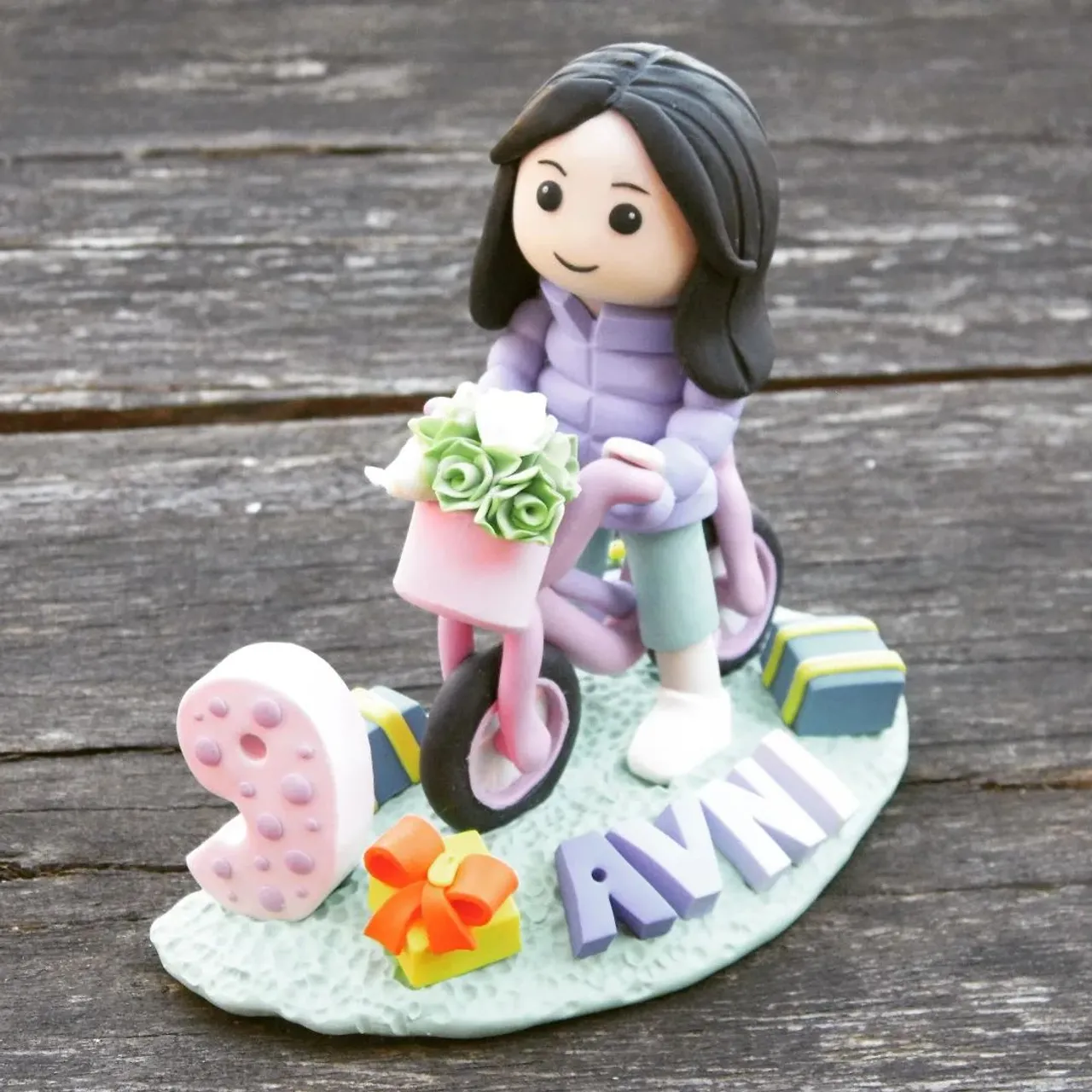 Girl on the bike, unique gift and a beautiful keepsake for life 😊 #girlbirthday #girlonbike #birthdaycake #girlfigurine #cakedecorations #birthdaycenterpieces #centerpieces #birthdayparty #etsymarket #etsyseller #birthdaygift #personalized #personalizedgifts #keepsake #deskdecor #uniquegift