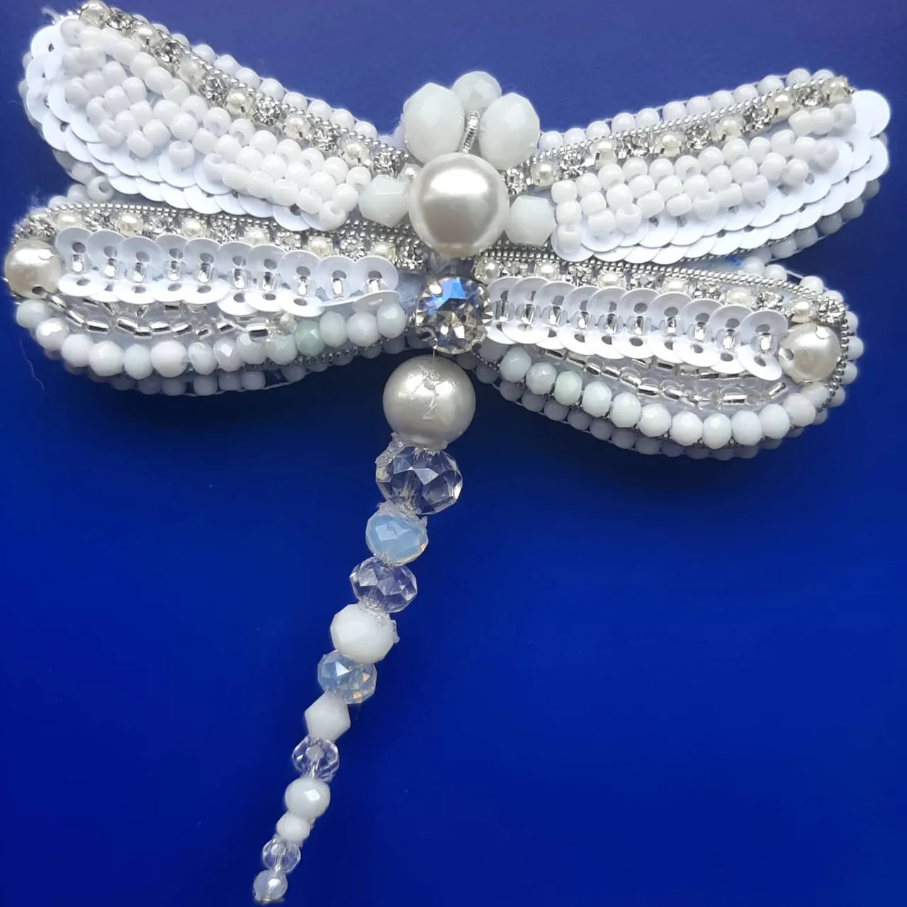 Белоснежная невеста стрекоза. Изготовлена из бисера, пайеток, бусин и кристалла. Изнанка серебристый кожзам и магнитная застёжка. Изумительная брошь в наличии. Подробнее 🔽 на сайте
🇺🇦🇺🇦🇺🇦Для заказа по Украине 
https://shafa.ua/member/olgashulgina20
Или https://shulginaolga2.crafta.ua/
🌏🌏🌏🌎🌎🌎🌍🌍🌍🌍🌍🌍Доставка в другие страны 
https://www.etsy.com/shop/DigiUniquePrintBox?ref=seller-platform-mcnav
#брошьсбисера #брошьукраина #купитьброшь #брошьвподарок #брошьспайеток #брошьсвоимируками #вышитаяброшь #брошьхендмейд #handmadebrooch #beadedbrooch #buybrooch