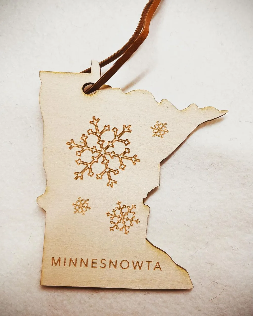 NEW DECOR!!!! Featuring our latest addition for you to order. Want it customized? D.M.  me. Web link in profile. 

#new #ornament  #christmas #christmaspresents #giftideas #madeinmn #wholesale #custom #minnesota #madeusa🇺🇸 #madeinamerica #minnesnowta #christmascountdown