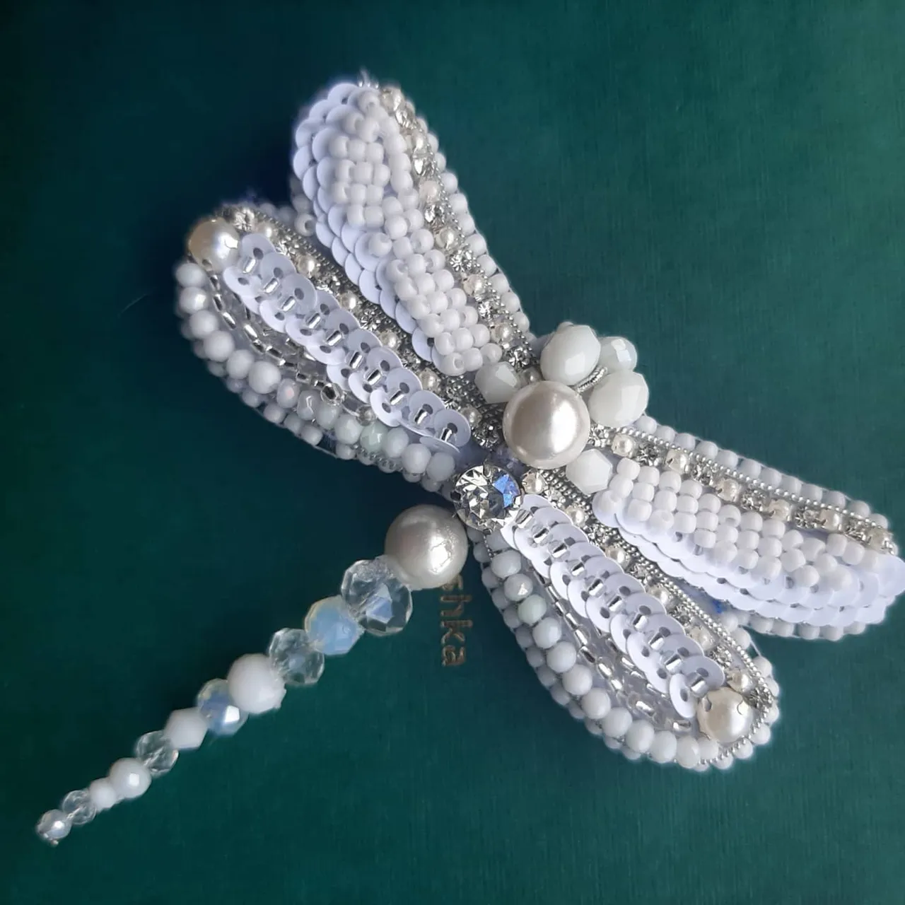 Белоснежная невеста стрекоза. Изготовлена из бисера, пайеток, бусин и кристалла. Изнанка серебристый кожзам и магнитная застёжка. Изумительная брошь в наличии. Подробнее 🔽 на сайте
🇺🇦🇺🇦🇺🇦Для заказа по Украине 
https://shafa.ua/member/olgashulgina20
Или https://shulginaolga2.crafta.ua/
🌏🌏🌏🌎🌎🌎🌍🌍🌍🌍🌍🌍Доставка в другие страны 
https://www.etsy.com/shop/DigiUniquePrintBox?ref=seller-platform-mcnav
#брошьсбисера #брошьукраина #купитьброшь #брошьвподарок #брошьспайеток #брошьсвоимируками #вышитаяброшь #брошьхендмейд #handmadebrooch #beadedbrooch #buybrooch