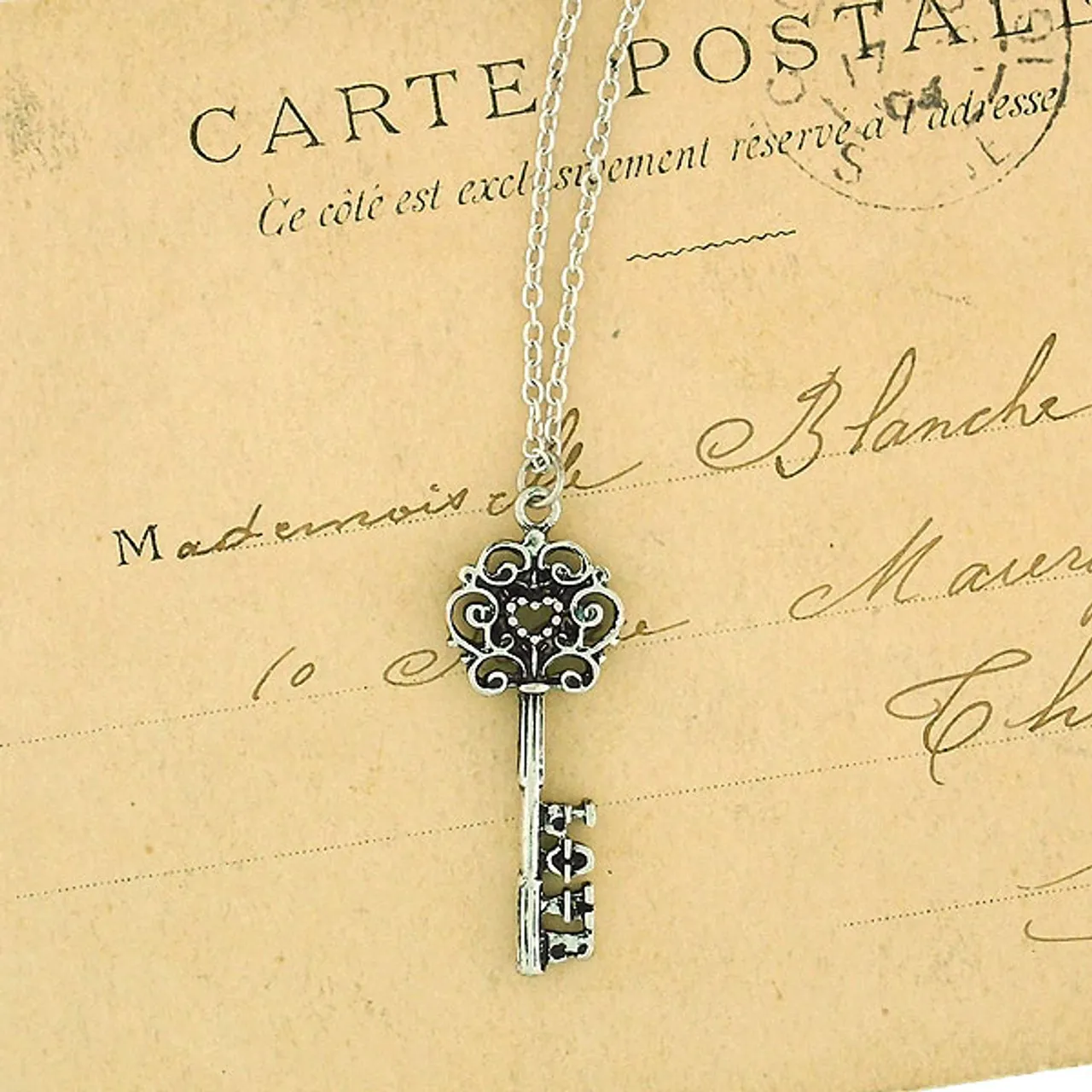 LAVISHY 883-102 vintage style key of love necklace: From Flare collection by LAVISHY, this handmade vintage style key of love pendant necklaces were original designs of LAVISHY. We are quit proud of this design where you place a heart shape in the middle of the top part the key and LOVE at the end of the key. They make great gifts for your loved one.
Base metal: Zinc alloy
Plating: Imitation silver, gold, brass, antique silver & antique gold
Safety: Nickel & lead free, non-allergenic / hypo-allergenic
Measurement:
 -Pendant:  inch /  cm
 -Chain: 18 inch with 2 inch extension chain LAVISHY logo tag
Wholesale available at www.lavishy.com with other unique & fun fashion jewelry for gift shop & boutique buyers. We ship worldwide since 2001.