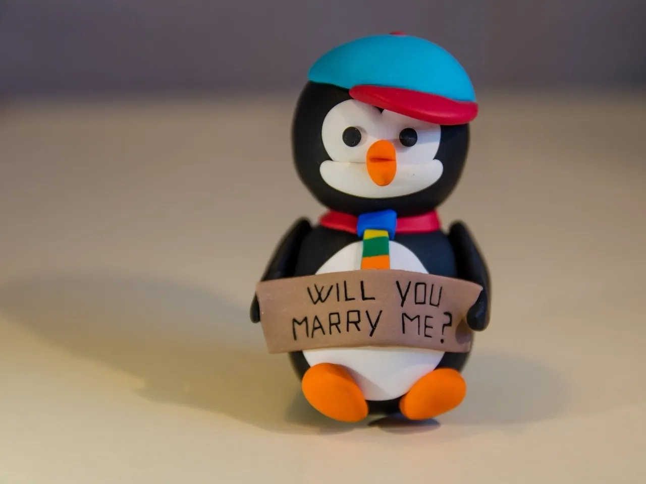 This would be so wonderful and different way to ask that special someone "Will you marry me"
An adorable penguin is sure to garner a "YES from your loved one :D 
Set him on the nightstand, on the bathroom sink, next to the coffee mug, put him on a birthday cake....the possibilities are endless! :) #penguin #penguinfigurine #willyoumarryme #marryme #proposals #proposal #uniqueproposal #engagement #engagementornament #proposalideas #Etsyseller #smallbusiness #Etsyshop #polymerclayart #polymerclayartist #personalizedgifts #personalizedmessage #penguins #handmade #Etsysuccess #Etsyhandmade #etsyartist #Christmasproposal #Christmaswedding #penguincollection #kawaiifigurine #kawaii #kawaiicharms #kawaiipenguin