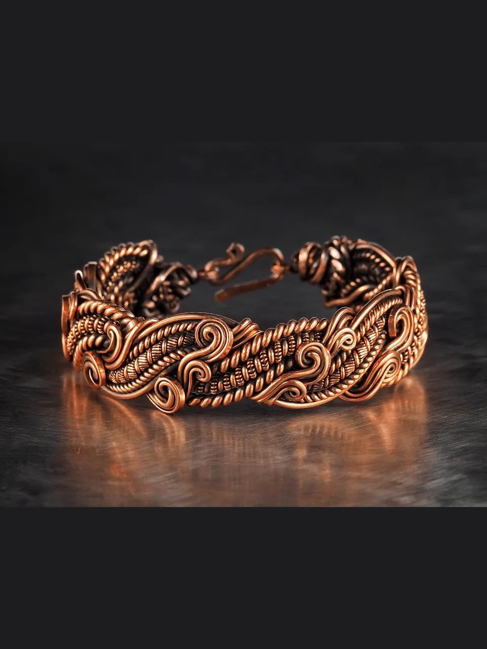 Wire wrapped copper bracelet by WIREWRAPART
❂ This beautiful pure copper bracelet by WIREWRAPART jewelry makes the perfect 7th or 22nd Anniversary gift.
❂ This unique copper wire wrapped bracelet is a timeless addition to any jewelry collection and is sure to be treasured by your loved one.
❂ Crafted with high-quality copper wire, this bracelet is durable and long-lasting. This one, like any bracelet from my store, is one of a kind.
❂ This handcrafted copper wire bracelet features an antique style design, carefully crafted with intricate copper wire wrapping techniques.
❂ The warm tones of copper will beautifully complement any skin tone, making this bracelet a versatile and timeless accessory.
❂ Perfect for both casual and formal occasions, this wearable art piece will make a statement wherever you go.
❂ The copper bracelet is a functional solution for pain relief. This bracelet is a must-have for anyone seeking a natural approach to managing pain.
❂ The antimagnetic properties of this copper bracelet are designed to block harmful EMF waves, reducing exposure to potentially harmful radiation.