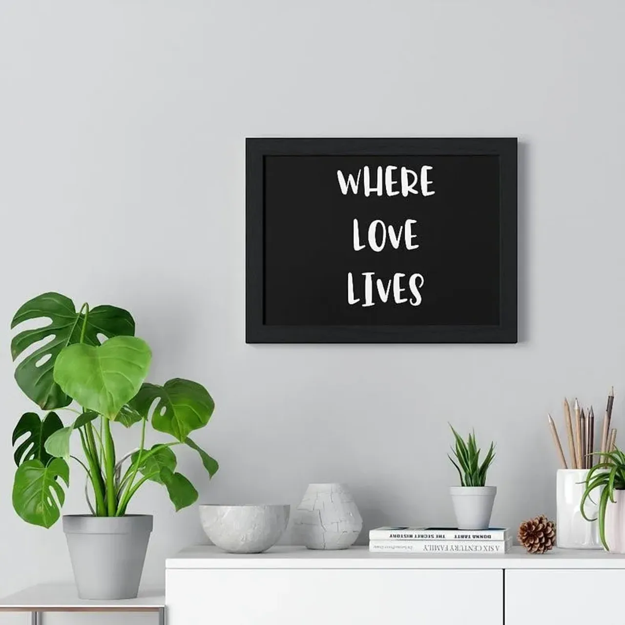 Where Love Lives Framed Artwork. Comes in Black and White frames and many different sizes. #etsy #smallbusiness #etsyshop #etsysellersofinstagram #graphics #walldecor #wallart #homedecor #hangingart #framedart #accessories #decor #decoration #love #amor #romance #homesweethome #homedesign #homeinspiration #motivation #inspiration #hangingwallart #wallartdecor #wherelovelives #giftideas #framedart #framedartwork #graphicdesign #graphicdesigner