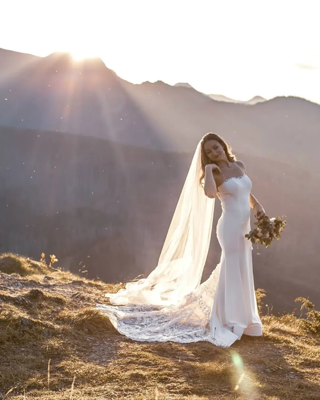 We present you our Bride - this is Anna! 😍 We sew that wedding dress based on one of our delightful designs - Palmyra (https://www.etsy.com/listing/776552521/). • You can't hide that this lace train is simply delightful, the front is a completely different story! Anna decided to add a slit for leg, change the neckline to the shape of the heart and add lace elements at the neckline and in the leg slit! • For the dress we made a classic long veil from delicate Italian tulle. 
Thank you very much for sending photos in a beautiful Scottish climate! 🥰
---
Handmade wedding and evening dresses. Buy ready dress or make online custom order on our Etsy shop
👉 Link in bio
https://www.etsy.com/shop/AtelierLuckyDress
---
#realbride #luckydressatelierbride #weddingday #husbandandwife #brideandgroom #weddingcouple #brides #bridestory #bridetobe #bridedress #weddingdressideas #weddinggowns #weddingdays #brideinspiration #brideoftheday #handmadeweddingdresses #weddingdresshandmade #bridaldressmaker #sexyweddingdress #sexybride #mermaidweddingdress #scottishwedding #scottishbride #scottishwievs #scottishgroom #weddingphotosesion