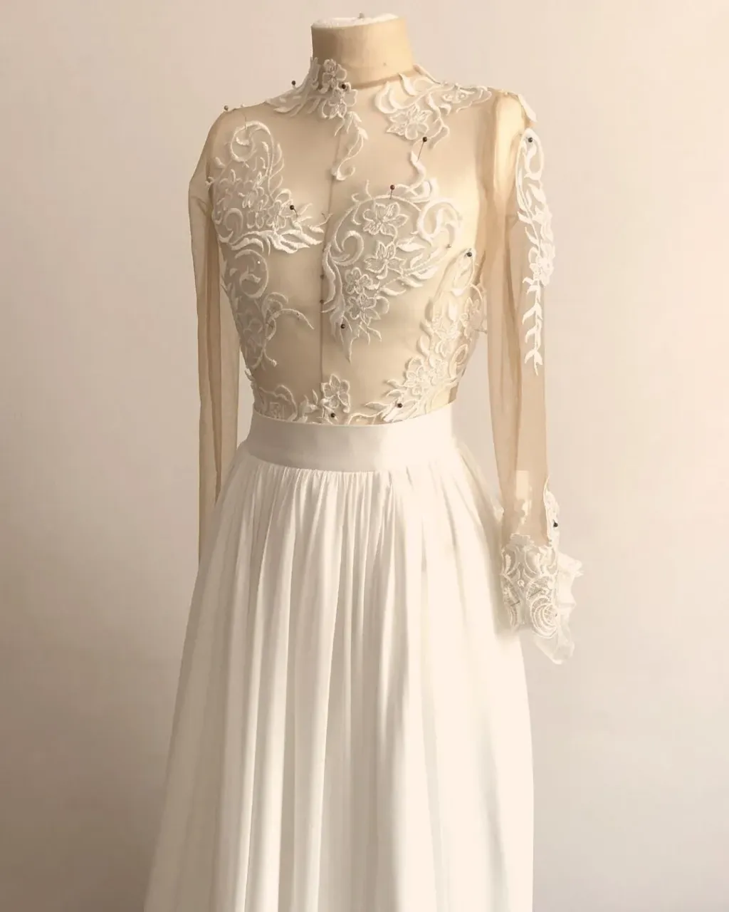 The summer season ☀ is in full swing and we've just picked up photos from our #luckybride Hong Trang Mai! 🥰

Trang wrote to us on Etsy asking us to sew a two piece wedding dress for her, consisting of a long sleeved bodysuit and a flowing skirt.

The base for the body is a nude elastic mesh on which we sew lace elements to achieve a phenomenal tattoo effect! On the other hand, the skirt was made of a viscose lining and a circle cut muslin. Just look at this effect! 🤩🤩🤩

The wedding dress finally went to Germany from our Krakow (Poland) #weddingatelier. ;) Just to mention that we sewed the wedding dress without a single fitting. The entire process was online. :)
---
We sew bespoke wedding dresses from scratch! Choose a ready-made wedding dress design, make changes or create your own unique wedding dress. We make on-line orders!
 
#atelierluckydress #customweddingdress #bespokeweddingdress #tailoredweddingdress #bridalgown #weddingdress #elopementdress #elopementweddingdress #elopementwedding #weddingboudysuit #weddingskirt #twopieceweddingdress #courthousewedding #realbride #bridetobe #groom #husbandandwife #longsleeveweddingdress #tattooweddingdress