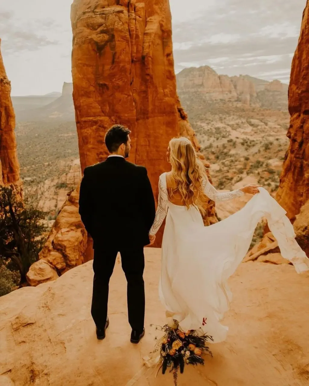 We couldn't decide which photo to add first!!
OMG!🤩🤩 You must see all the pictures! 
What a place, what a couple! 😮😍

Meet beautiful Melissa, our next bride in a dress of our project 💗💗
Long, light train, very cut back, long sleeves trimmed with special lace 🥰 How do you like it?

On Instastories we add photo of this dress from our atelier, before ship to our #luckybride!

And if you are looking for a wedding photographer from Arizona just check @allisonslater 💕💕

Of course, we can sew also your dream wedding dress!🥰🥰 
Just contact with us!
ETSY➡️ AtelierLuckyDress
💌➡️ luckydress77@gmail.com
DM 🎀

#adventureweddingphotographer #elopementlocation #elopementplanning #adventureelopement #sedonaelopement #sedonawedding #cathedralrock #sedonaweddingphotographer #arizonaelopement #weddinggowndesigner #bohobridal #arizonaelopementphotographer #newlyweds💍 #weddingdresstoronto #bohodresses