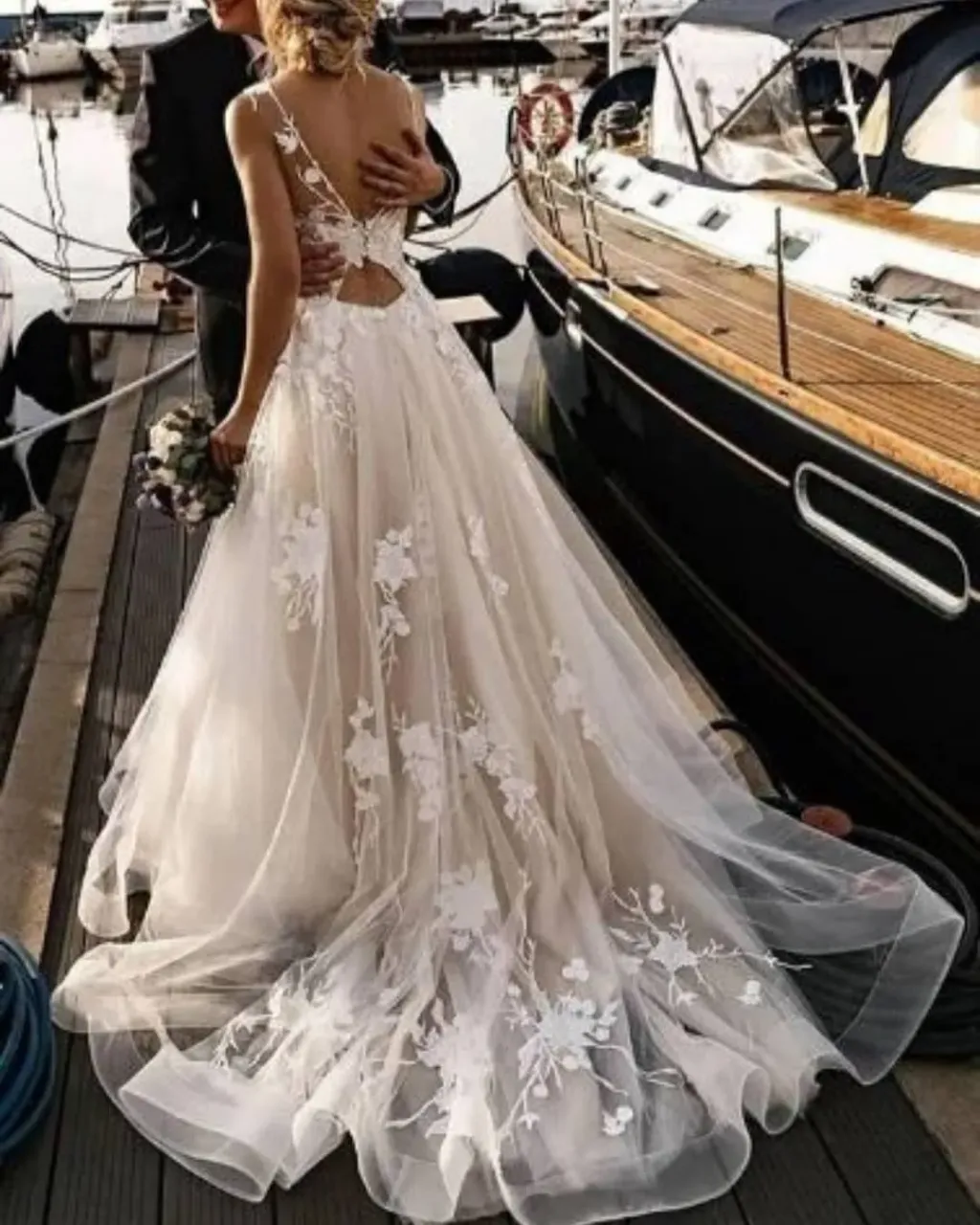 We were asked for a wedding dress inspired by these two wedding dresses. 😍 The front of our wedding dress - Gabriela from the 2020 collection and the back of this wedding dress found on the internet. You will see the effect in the following photos.🥰 The dress was made completely online! No fitting! And it flew to Colorado Springs, USA! 🥳 👉 How to order a wedding dress online? You will find out at this link: http://www.lucky-dress.eu/en/
#weddingdress #weddingdresses #weddinggown #dreamwedding #weddingday #bridaltrends #bridalgowns #bridalstylist #bohoweddinginspo #bohoweddingstyle #bohoweddinggown #bohodresses #bohodressstudio #rusticdress #rusticdresser #rusticweddingideas #rusticweddingdress #rusticweddingstyle #bridaldesigner #bridaldressmaker
