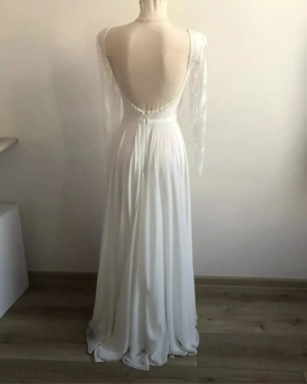And here is the wedding dress from the previous post on a mannequin in our wedding atelier. 😉
How do you like our design of the wedding dress? Which element of the dress stole your heart the most? Let me know in the comments! 🥰
---
We sew handmade wedding dresses from scratch! Choose a ready-made wedding dress design, make changes or create your own unique wedding dress. We make on-line orders!
 ---
#customweddingdress #handmadeweddingdress #custombridalgown #handmadebridalgown #weddingatelier #weddingdressdsign #bridalgowndesign #laceweddingdress #longsleeveweddingdress #chiffonweddingdress #trainweddingdress #backlessweddingdress #lacebridalgown #longsleevebridalgown #chiffonbridalgown #trainbridalgown #backlessbridalgown #bohobridetobe #bohobridestyle #bohobride2021 #bohoweddings #bohoweddingideas #bohoweddingdresses #bohoweddinginspo #bohoweddingstyle #bohoweddinggown #bohodresses