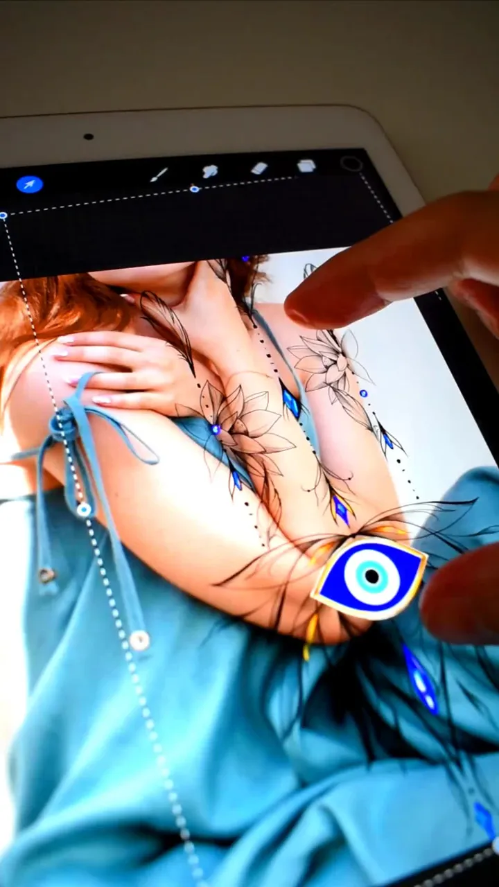 Lotus evil eye tattoo design