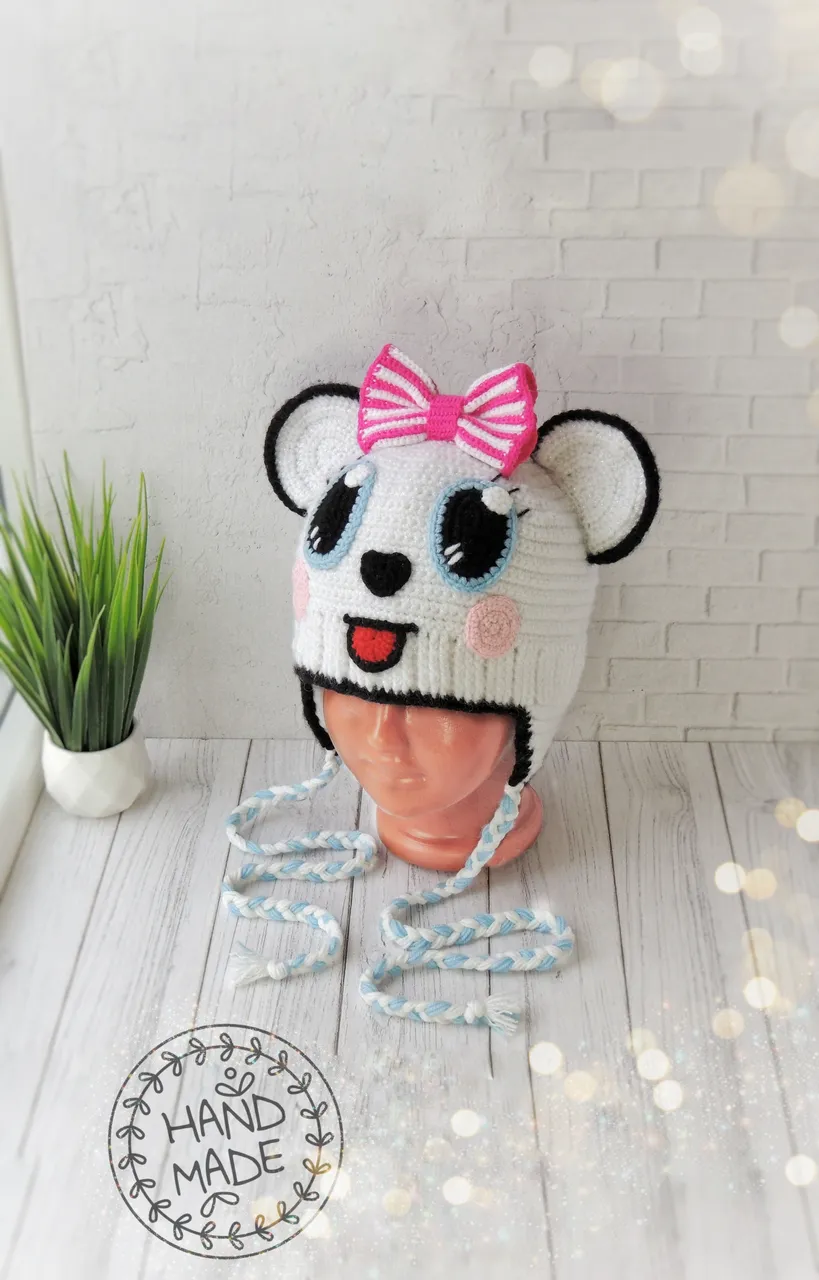 My knitted panda hat is a real find for all ages! It has many advantages that make it attractive and versatile.

First, this hat is perfect for children, but can also be worn by adults. The panda face with large eyes and ears creates a cute and playful look that is sure to catch the attention of others.

Secondly, the beautiful bow on the panda's head gives the hat a sophisticated and playful look. The hat will be a great addition to a Halloween costume or other holiday costume.

In addition, the hat is made using quality yarn. This guarantees the comfort and durability of the product, so you can enjoy its warmth and beauty for a long time.

All in all, my crochet hat is a versatile accessory that will suit both children and adults. Not only is it warm and comfortable, but it's also stylish, making it the perfect choice for a Halloween costume or just for creating a fun and original look.
.
.
.
#panda
#pandahat
#pandabeanie
#crochetpanda
#knittingpanda
#pandahatadult
#Halloweencostume