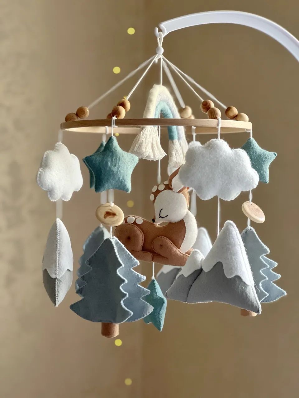 Children's mobile for the crib "Fawn in the forest". 

It is possible to change the color and content of the mobile.