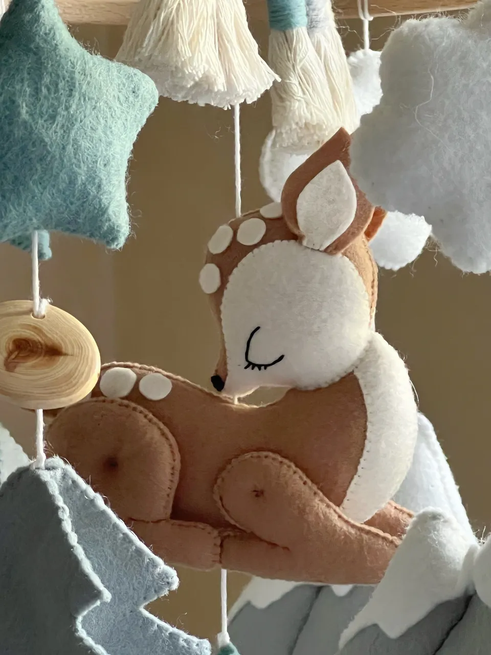 Children's mobile for the crib "Fawn in the forest". 

It is possible to change the color and content of the mobile.