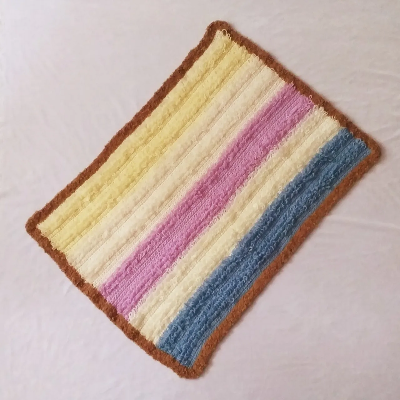 Multicolored wool carpet for a children's room.