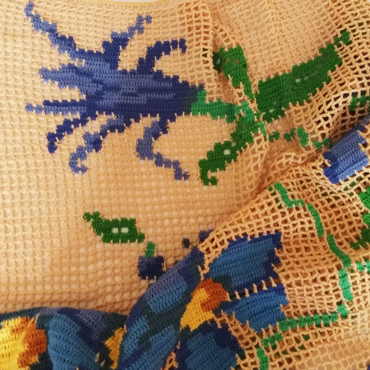 Filet style crochet tablecloth.