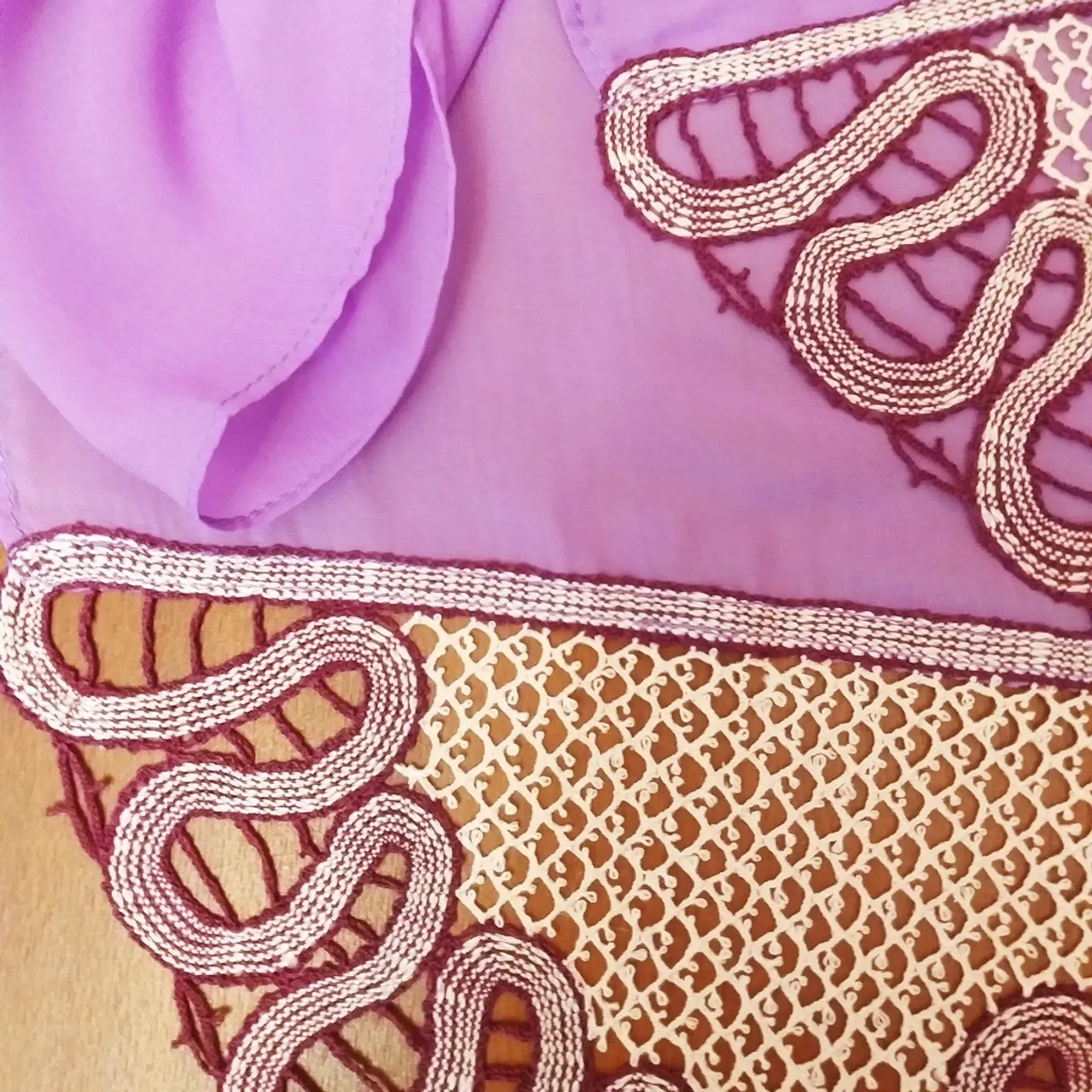 Detailed patterns with instructions for making lace edges for a scarf.