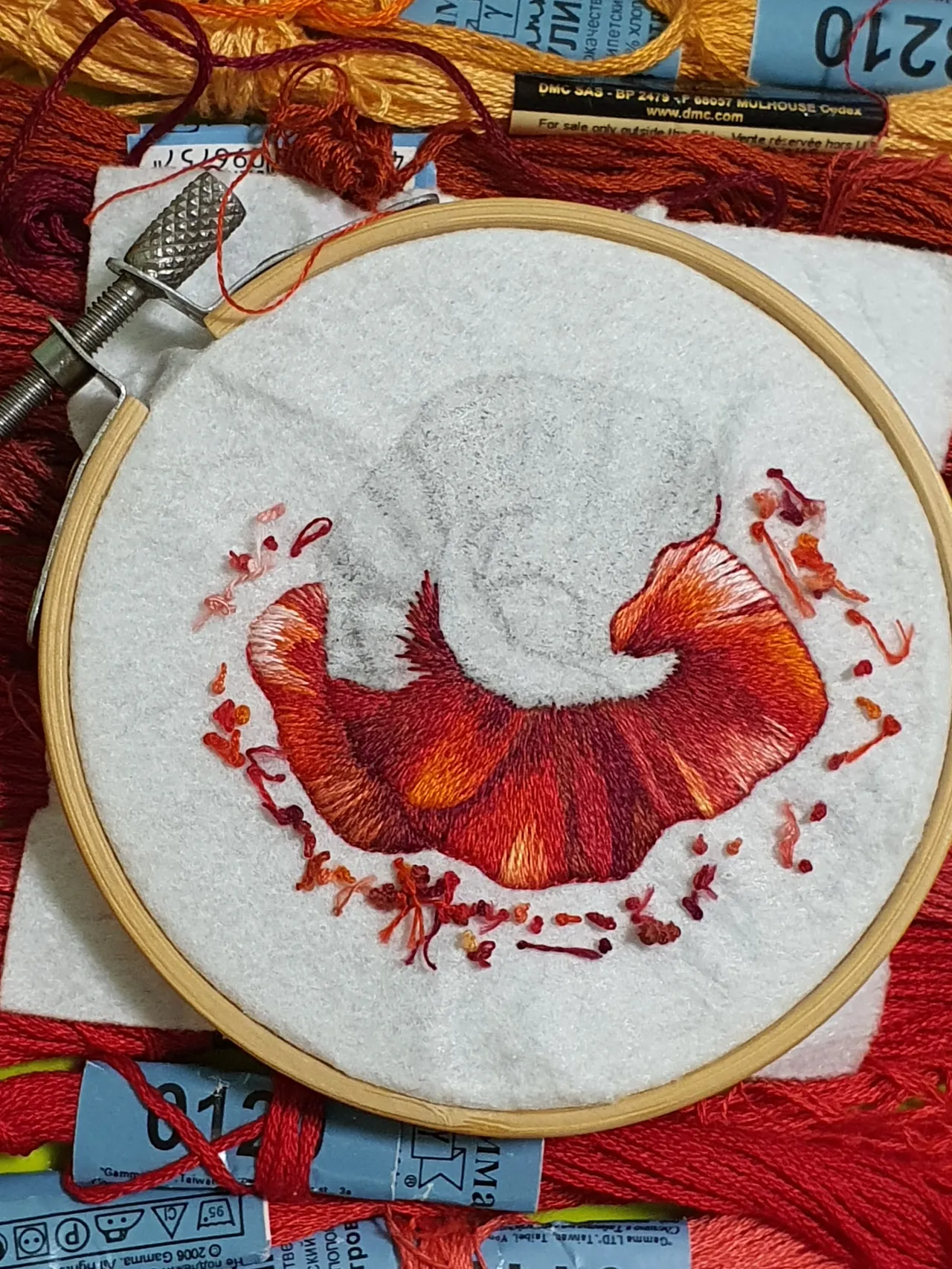 A couple of strokes of the magic needle and the embroidery will turn into a beautiful brooch.