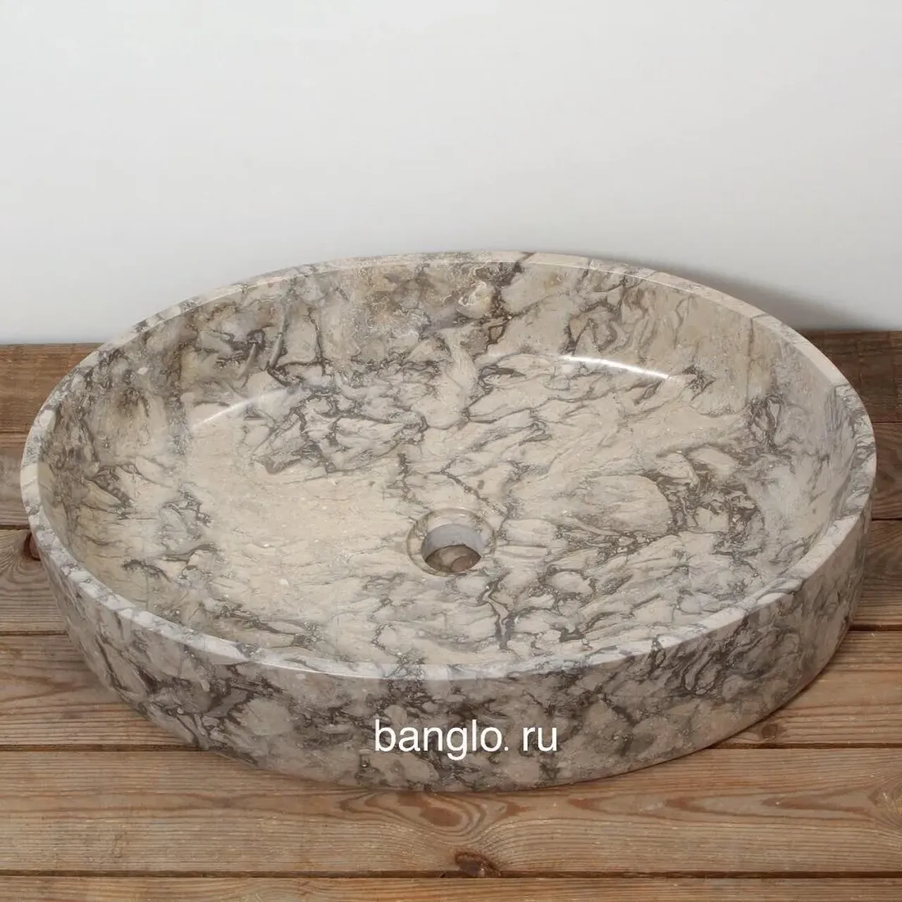 .
🔰Природный мрамор обладает массой достоинств, позволяющих использовать его в разных областях жизни. Однако наиболее удачно он применяется для изготовления элитного сантехнического оборудования, в том числе раковин из мрамора.
.
Размеры (ШxГxВ)	60х40х14 см
.
.
#banglo#раковиныbanglo#раковинаизокаменелогодерева#раковиныизкамня #раковиныизнатуральногокамня #раковинаизоникса #раковинаизмрамора #работаскамнем#дизайнерскаяпродукция #декорванной #ваннаякомната #аксессуарыизкамня #раковинадляванной#элитнаясантехника#лофт #лофтдизайн #лофтинтерьер #ваннаякомнатадизайн #дизайнподключ#мрамор#раковина #раковинынастолешницу #раковиныдляванной #раковинымосква #раковиныспб