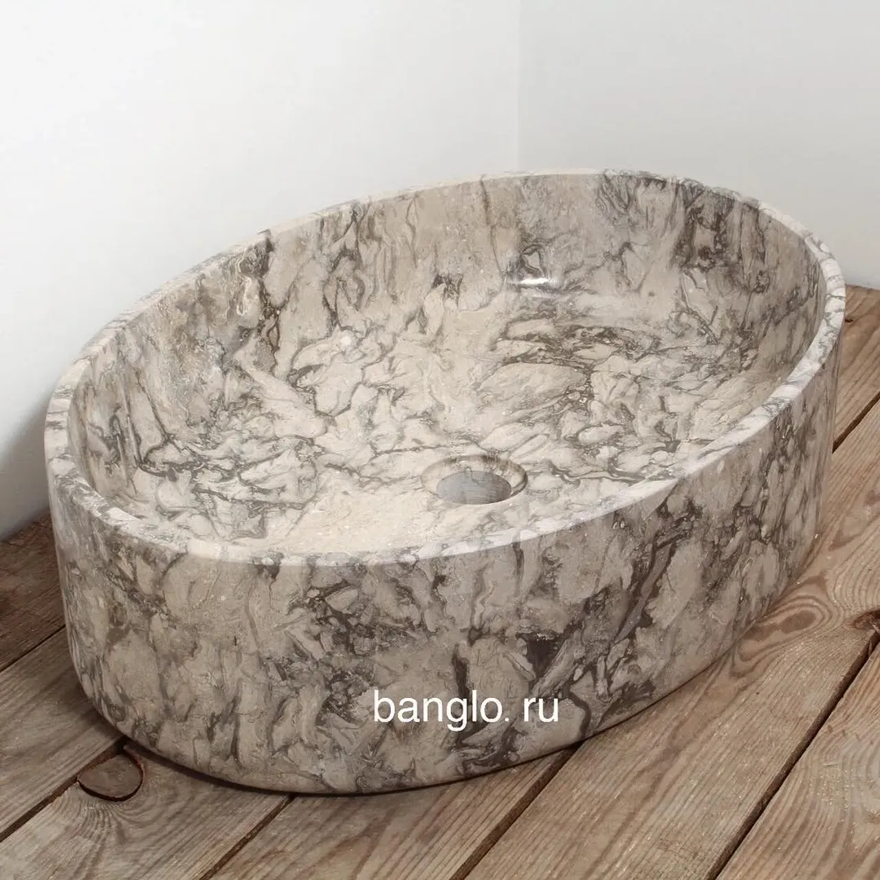 .
🔰Природный мрамор обладает массой достоинств, позволяющих использовать его в разных областях жизни. Однако наиболее удачно он применяется для изготовления элитного сантехнического оборудования, в том числе раковин из мрамора.
.
Размеры (ШxГxВ)	60х40х14 см
.
.
#banglo#раковиныbanglo#раковинаизокаменелогодерева#раковиныизкамня #раковиныизнатуральногокамня #раковинаизоникса #раковинаизмрамора #работаскамнем#дизайнерскаяпродукция #декорванной #ваннаякомната #аксессуарыизкамня #раковинадляванной#элитнаясантехника#лофт #лофтдизайн #лофтинтерьер #ваннаякомнатадизайн #дизайнподключ#мрамор#раковина #раковинынастолешницу #раковиныдляванной #раковинымосква #раковиныспб
