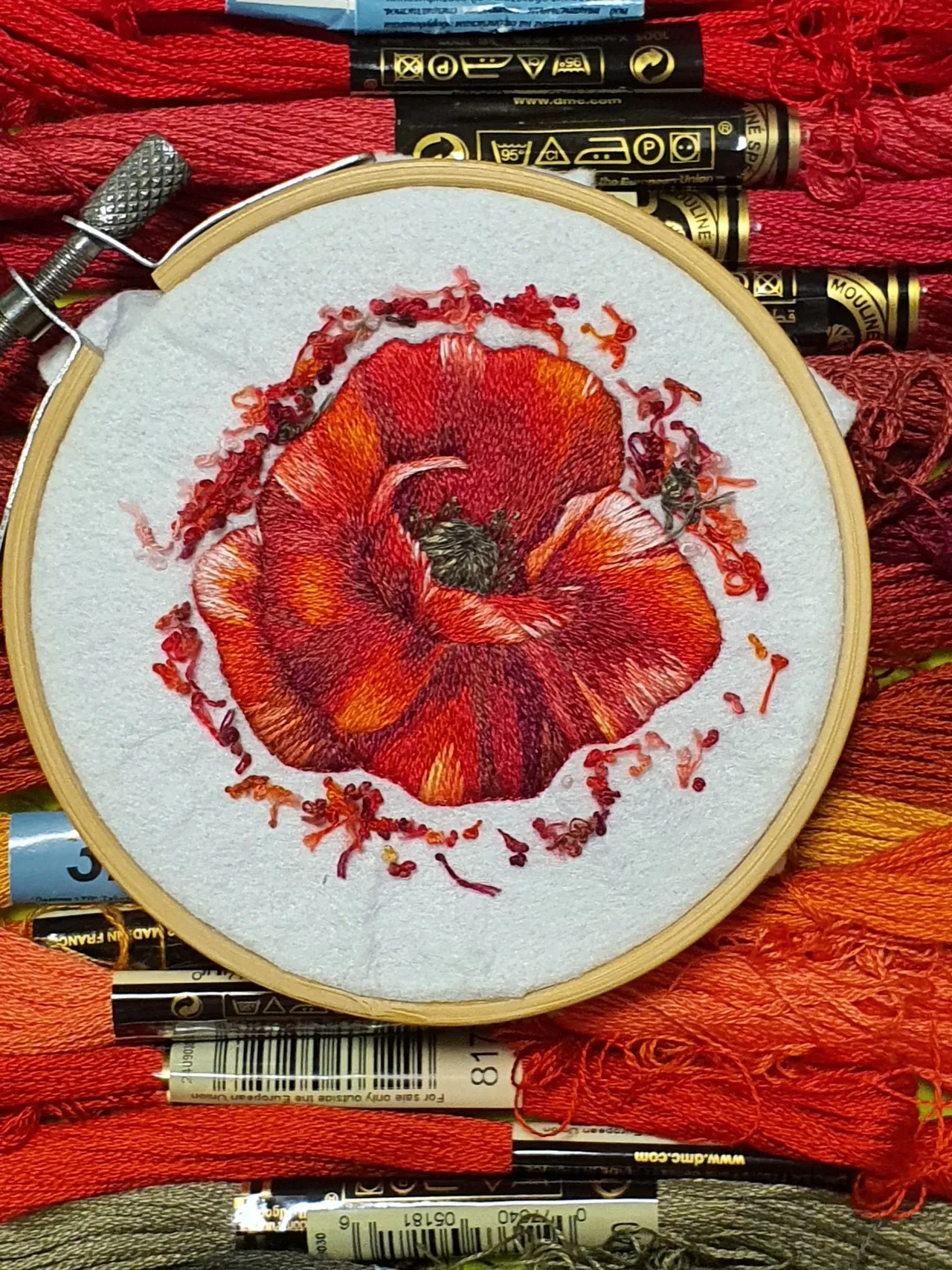 A couple of strokes of the magic needle and the embroidery will turn into a beautiful brooch.