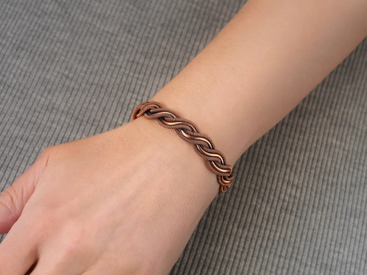 Unique wire wrapped copper bracelet for woman or man 7th 22nd Wedding Anniversary gift idea Unique pure copper wire wrapped jewelry Antique style Handmade statement artisan jewellery Healing copper therapy bracelet bangle
The bracelet is made of pure copper wire. The copper is artificially aged with patination, which gives an antique look and makes the details of the bracelet more expressive. After patination, the bracelet was polished to a shine, which gives a beautiful aesthetic appearance to the bracelet. The bracelet is covered with a protective varnish to prevent darkening.
You will receive the exact bracelet you see in the photos.
The bracelet can be combined with any wardrobe and emphasize your uniqueness and style.
Bracelet width: 1.1 cm