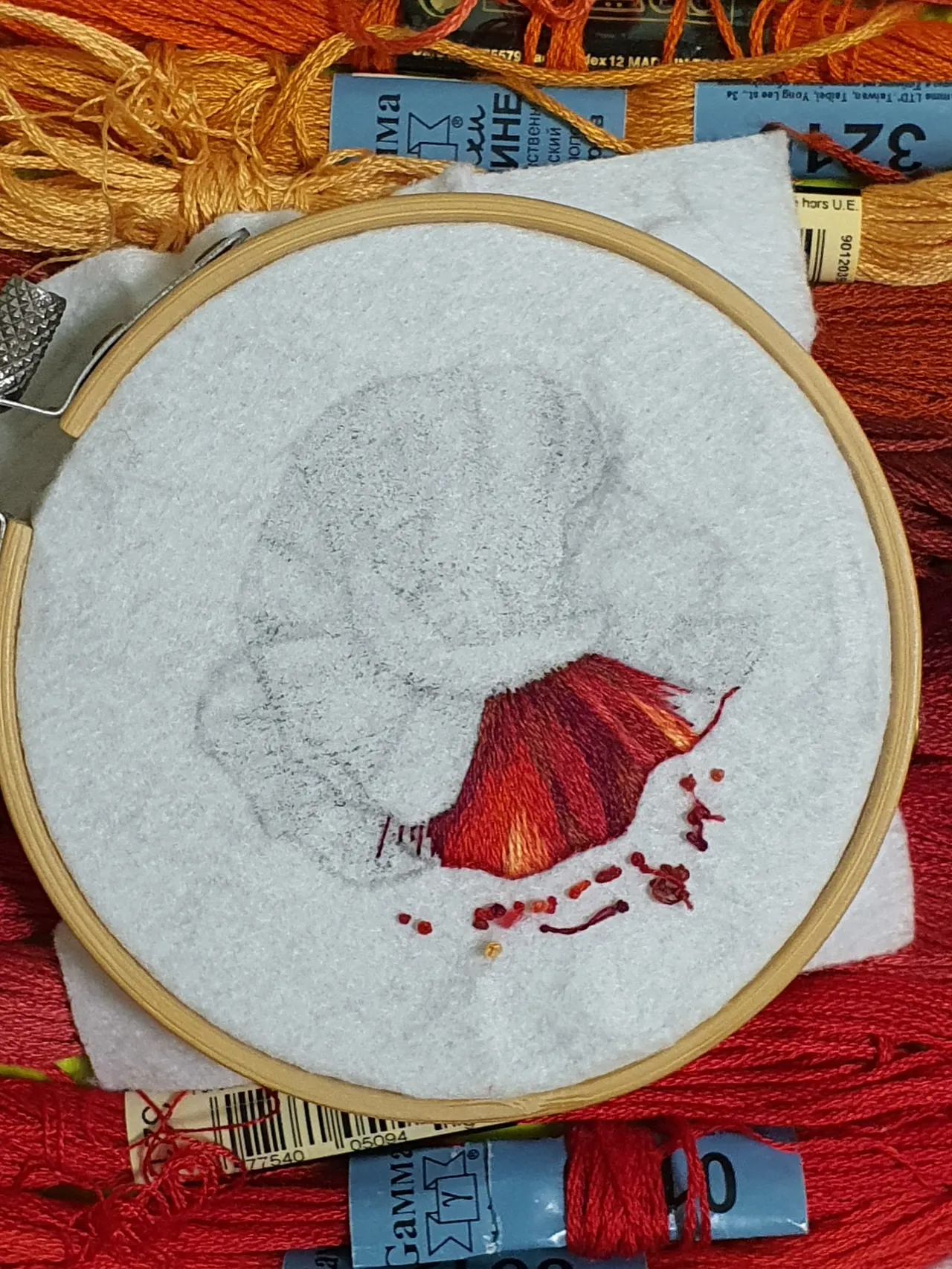 A couple of strokes of the magic needle and the embroidery will turn into a beautiful brooch.