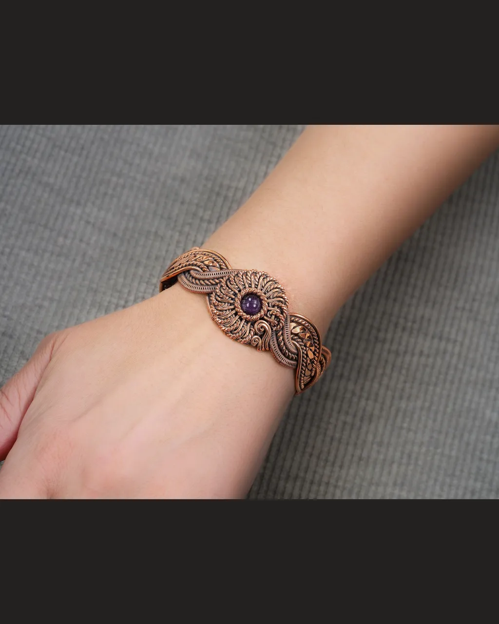 Copper wire wrapped Amethyst bracelet for woman, Statement flower jewelry, 7th Anniversary gift for her woman, Unique copper jewelry, Braided Art Nouveau antique style bracelet, Oxidized pure copper, Handmade
❂ The bracelet is made of pure copper wire and natural amethyst . The copper is artificially aged with patination, which gives an antique look and makes the details of the bracelet more expressive. After patination, the bracelet was polished to a shine, which gives a beautiful aesthetic appearance to the bracelet. The bracelet is covered with a protective varnish to prevent darkening.
You will receive the exact bracelet you see in the photos.
The bracelet can be combined with any wardrobe and emphasize your uniqueness and style.
Bracelet Width:2.6 cm