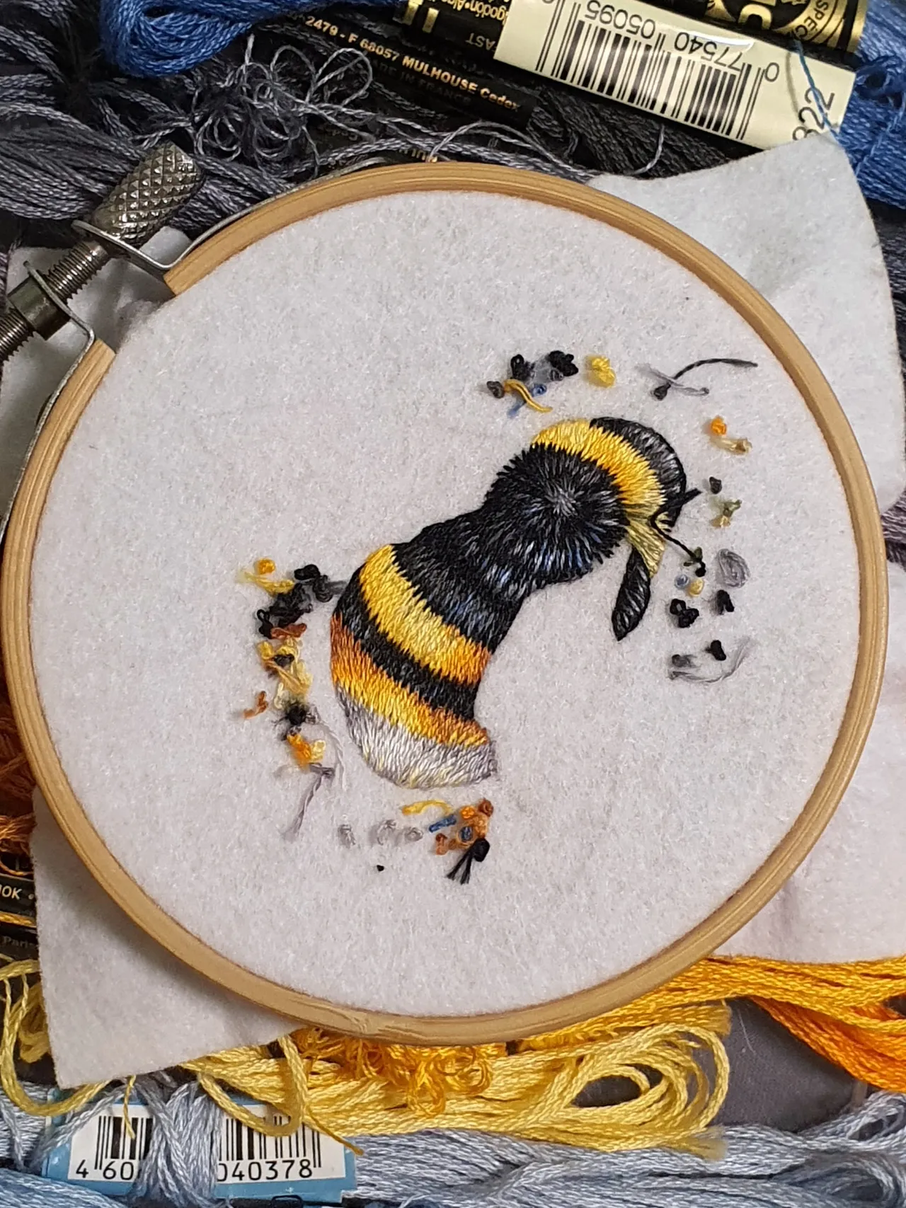 I am drawing. My paints are threads, and my brush is a needle in my hands. Please like if you enjoy watching the embroidery process.