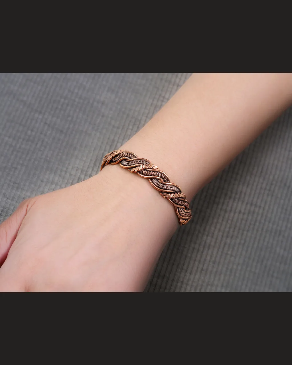 Wire wrapped bracelet, Unique 7th 22nd Anniversary gift idea, Art Nouveau antique style, One of kind braided statement bangle, Handmade oxidized pure copper jewelry, Pain relief, EMF protection
❂ The bracelet is made of pure copper wire. The copper is artificially aged with patination, which gives an antique look and makes the details of the bracelet more expressive. After patination, the bracelet was polished to a shine, which gives a beautiful aesthetic appearance to the bracelet. The bracelet is covered with a protective varnish to prevent darkening.
You will receive the exact bracelet you see in the photos.
The bracelet can be combined with any wardrobe and emphasize your uniqueness and style.
Bracelet Width: 1.1 cm