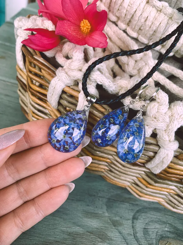 New set of jewelry with real forget-me-not flowers