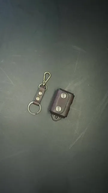 Leather pattern to make keychain - case for Zippo.

The leather pattern to make keychain - case for Zippo is the perfect accessory for anyone looking to add style and functionality to their Zippo lighter. (Fit for Zippo: Classic; Armor; 1941 Replica).
Crafted from high-quality leather, this pattern allows you to create a custom keychain that also serves as a protective case for your Zippo. 
The sleek design and durable construction make it a must-have for anyone who wants to keep their lighter safe and easily accessible. 
With the option to personalize the design, you can create a one-of-a-kind accessory that reflects your unique style. 
Upgrade your Zippo game with this leather pattern and make your keychain the envy of all your friends.