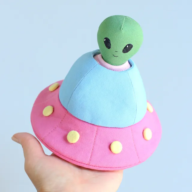 Do you think that aliens exist? Of course! Here's one of them! And you can sew it yourself! :)

Sew this pocket-sized alien softie together with their flying saucer (UFO). The sewing process is quick and easy with my sewing pattern! You will enjoy it and your little one will love their new tiny plushie with a space craft. Let the space adventure begin!