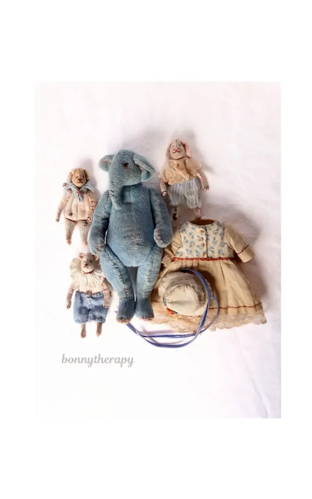 The adorable elephant with an own little toys
is sure to become a favorite toy for your child and will delight your eyes.