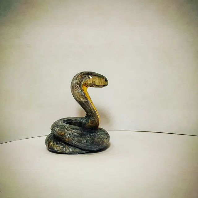 Wooden toy, snake cobra.