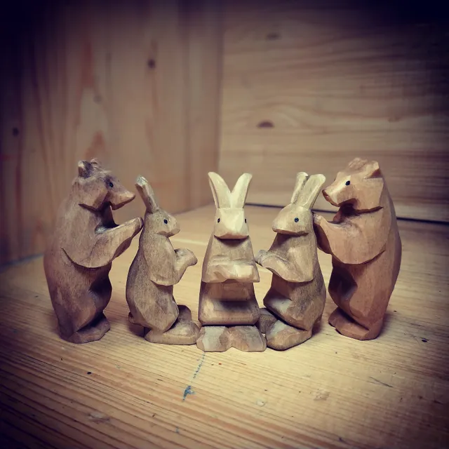 Wooden toys, bear cubs and bunnies.