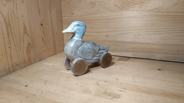 Wooden toy, duck on wheels